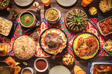 Arabic Cuisine: Middle Eastern Traditional Lunch. It's Also Ramadan "Iftar". The Meal Eaten By Muslims After Sunset During Ramadan. Assorted Of Arabic Oriental Dishes. Top View With Close Up. 