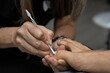 © Amilciar - A Latin American woman receives a pedicure treatment at a beauty salon
