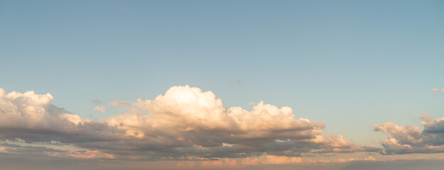 Wall Mural - beautiful panoramic sky replacement sunset background starting at the horizon with layers of fluffy 