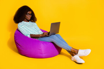 Canvas Print - Full size photo of attractive lady sitting bag use wireless netbook coworking isolated on yellow color background