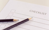 Fototapeta  - Checklist concept - checklist form paper and pencil on white table