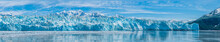 A Panorama View Of The Ice Wall Of The Snout Of The Hubbard Glacier In Alaska In Summertime