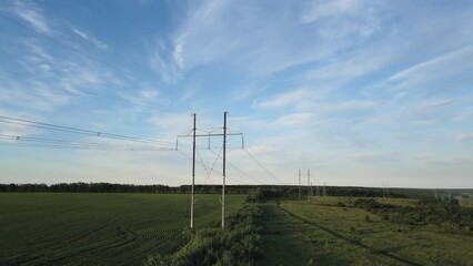 Wall Mural - High voltage power line on industrial electricity line tower for electrification rural countryside