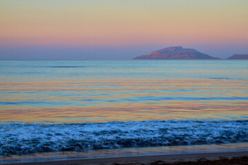 Wall Mural - island at sunrise with beautiful colors on the pacific ocean with blue water on the coast of mazatlan sinaloa