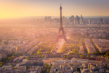  Eiffel tower and La Defense at dramatic sunrise Paris, France