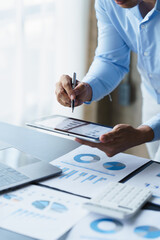 Poster - Businessman analysis maketing plan, Accountant calculate financial report, computer with graph chart. Business, Finance and Accounting concepts