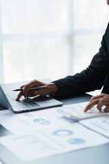 Poster - Businessmen working with graph data at office,Finance managers task,Concept business and finance
