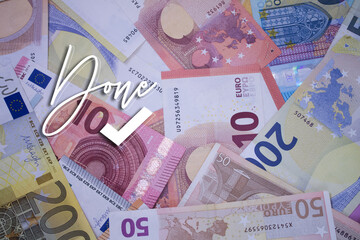 Poster - Done text with Checkmark with money. Paper currency background with different banknotes.