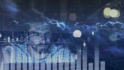 Poster - Animation of moving bar graph, data and clouds over tired caucasian businessman working on computer