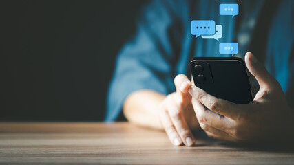 Poster - Man hand using smartphone typing live chat chatting on application communication digital web and social network concept. Social media application chat box.