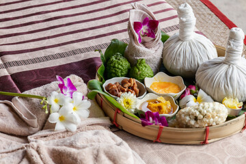 Natural thai aroma massage in thai spa Thai Spa aromatherapy. Massage spa body treatment aroma for healthy.Lifestyle Healthy Concept. female face healthy life luxury relaxation scrub treatment