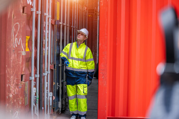 Poster - Engineer check goods and stock in industrial container terminal,Quality of product,Checking on shipping containers.