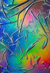 Poster - Glued colorful gradient holographic texture background. Dark futuristic blurred hologram colors. Abstract Rainbow foil for poster, cover art, overlay, banner, wallpaper, and print design.