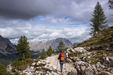 Wall Mural - tourist girl at the dolomites