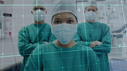 Poster - Animation of grid network over portrait of team of surgeons with arms crossed in operation theatre