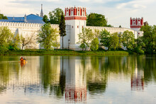 Walls Of Novodevichy Convent (New Maiden's Monastery) Reflected In Pond, Moscow, Russia