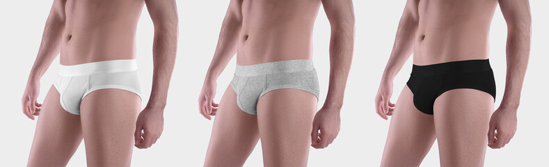 Wall Mural - Mockup of men's white, black, heather panties, briefs with a wide elastic band, isolated on a background, front, side view.