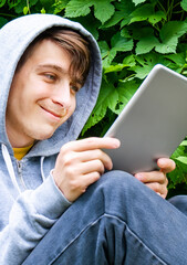 Sticker - Young Man with a Tablet