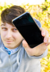 Canvas Print - Young Man with a Phone