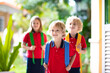 © famveldman - Child going back to school. Start of new school year after summer vacation. Little girl with backpack and books on first school day. Beginning of class. Education for kindergarten and preschool kids.