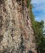 © Eric Gomez - Beautiful scene of woman climbing outdoors