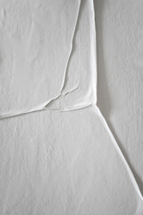 Aufkleber - Blank white glued paper for poster texture overlay. Crumpled and wrinkled pattern for background. Matted wet paper for mockup posters, flyer,  brochure, and banner design