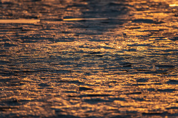 Wall Mural - Stone block pavement in the rays of the setting sun. Texture