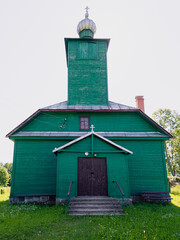 Canvas Print - Krivosejeva green Old Believers Church in sunny summer day, Latvia.