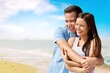 © BillionPhotos.com - Happy satisfied smiling young couple family man woman hug rest together at sunrise over sea beach ocean outdoor seaside in summer day