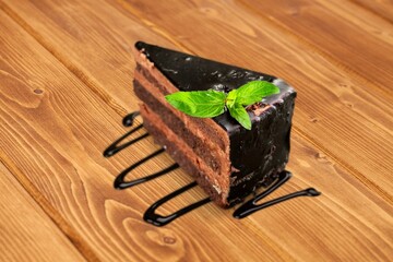 Canvas Print - Sweet pieces of delicious chocolate brownie on background