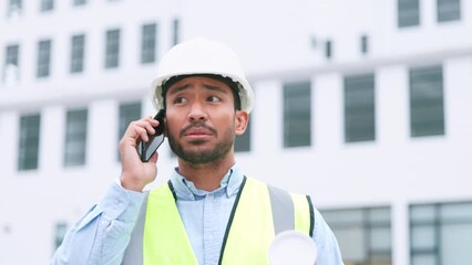 Poster - Civil engineer on a phone call while at a construction site discussing a strategy and plan to work on. Close up portrait of confident architect talking with building in the background and copy space