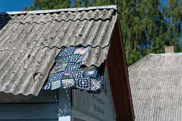 Old house with artwork, Rujiena, Latvia.