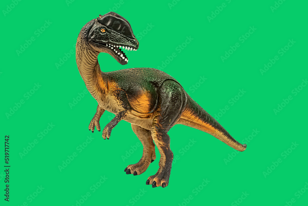 Dinosaur toy on green screen background. Take a photo and cut the ...