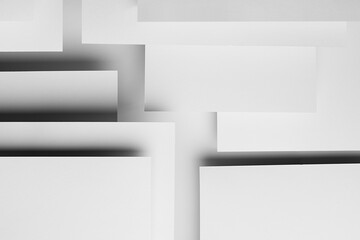 Poster - white abstract geometric background with white paper sheets soar as pattern of abstract spaces with 