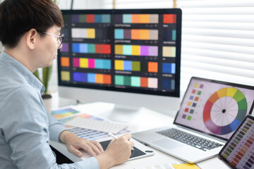 Professional development programmers are choosing color schemes to decorate their website or application to be attractive, Write information or code for the website,  HTML, Javascript, Color tone.