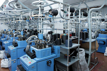 Industrial enterprise for the production of socks. Large production of socks. Lots of modern technology.