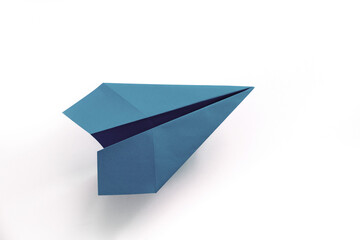 Wall Mural - blue paper plane origami isolated on a white background