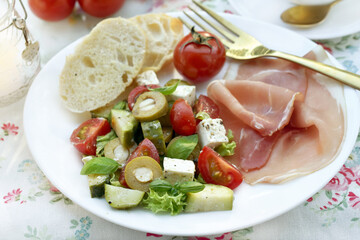 Wall Mural - Fresh mediterranean style salad with feta and vegetables