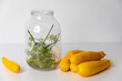 A glass jar for zucchini marinating