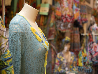 Wall Mural - oriental indian embroidery female dress detail at the market detail