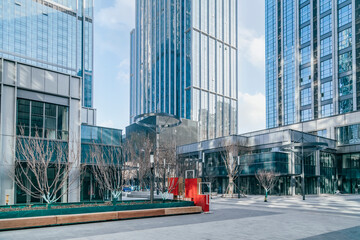 Buildings under blue sky and white clouds