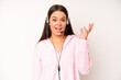 hispanic pretty woma looking happy, astonished and surprised. telemarketer concept