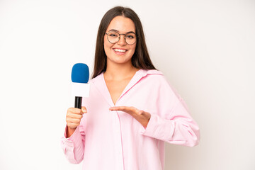 Wall Mural - hispanic pretty woma feeling extremely shocked and surprised. journalist with a microphone