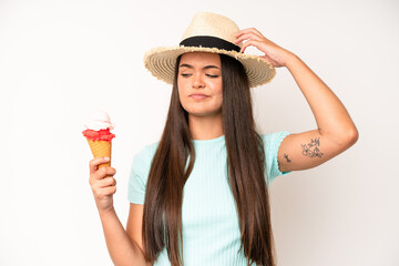 hispanic pretty woma smiling and looking friendly, showing number four. ice cream and summer concept