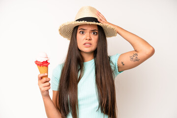 hispanic pretty woma shouting aggressively, looking very angry. ice cream and summer concept