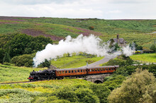 North Yorkshire Moors Railway. Vintage Steam Locomotive Railway Engine No.80072 Pulls Train South From Goathland, England, UK