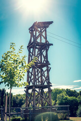 zip line tower under blue sky and the shining sun