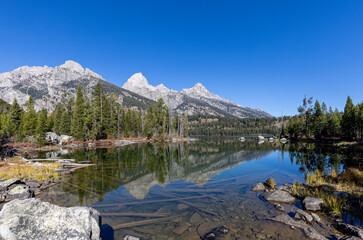 Sticker - Scenic Reflection Landscape of the Tetons in Taggart Lake in Autumn