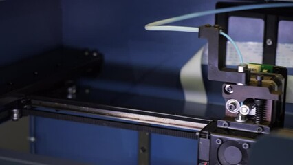 Wall Mural - 3D printer printing process. Media. Close up of 3d printing machine in motion at the factory workshop.