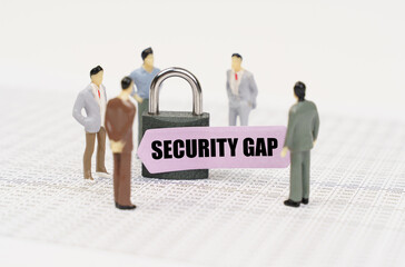 Poster - There are figures of people on business reports, a padlock with a sticker on which it is written - Security gap